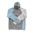 Crossed sleeves of men's gray and blue microgrid fleece hooded pullover with a half zipper and kangaroo pocket.